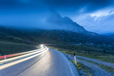 Traffic trail lights on Sella Pass, Province of Bolzano, South Tyrol, Italian Dolomites, Italy, Europe - RHPLF04108