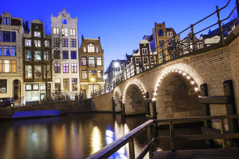 View of tall 18th century buildings on a canal in Amsterdam, Holland, Netherlands, Europe - RHPLF04447