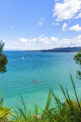 Scenic view of sea against sky at Abel Tasman Coastal Track, South Island, New Zealand - SMAF01357