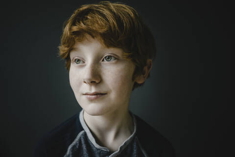 Portrait of redheaded boy with freckles stock photo