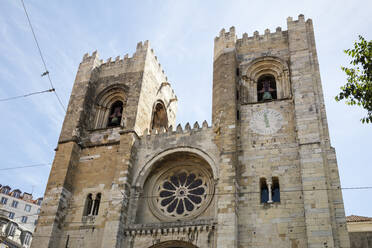 Low angle view of Lisbon Cathedral in city, Portugal - WIF03989