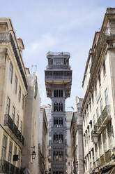 Low angle view of Santa Justa Elevator and buildings against sky, Lisbon, Portugal - WIF03997