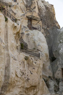 Low angle view of houses in rock formation, Cappadocia - KNTF03116