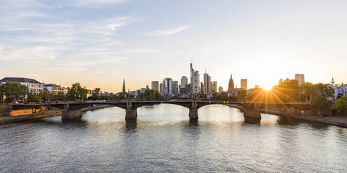 Ignatz Bubis Bridge over River Main against sky during sunset at Frankfurt, Germany - WDF05423