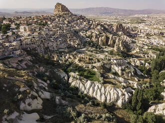 Aerial view of Uchisar castle and town in Cappadocia, Turkey - KNTF03156