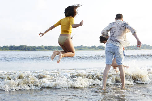 Friends having fun at he river - AMEF00067