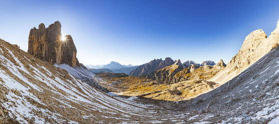 Panoramic view of Tre Cime di Lavaredo against clear blue sky during winter, Italy - WPEF01825