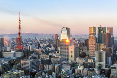 Elevated evening view of the city skyline and iconic Tokyo Tower, Tokyo, Japan, Asia - RHPLF04590