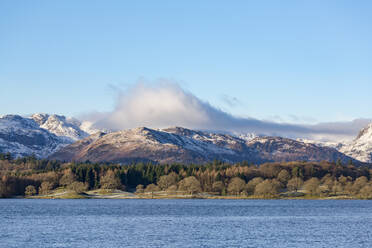 Looking towards the north end of Windermere near Ambleside, with rugged snow covered mountains including Helvellyn, Lake District National Park, UNESCO World Heritage Site, Cumbria, England, United Kingdom, Europe - RHPLF04745