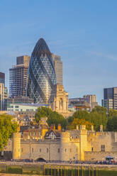 Tower of London, UNESCO World Heritage Site, and the Gherkin (30 St. Mary Axe), City of London, London, England, United Kingdom, Europe - RHPLF04769