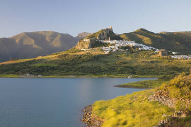 Moorish castle above white village and reservoir, Zahara de la Sierra, Sierra de Grazalema Natural Park, Andalucia, Spain, Europe - RHPLF05302