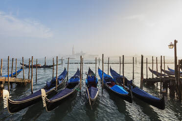 Gondola and San Giorgio Maggiore Church across Basino di San Marco, Venice, UNESCO World Heritage Site, Veneto, Italy, Europe - RHPLF05654