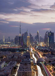 Financial Centre and Downtown at dusk, elevated view, Dubai, United Arab Emirates, Middle East - RHPLF05743