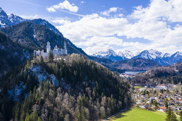 Aerial of Castle Neuschwanstein, with the Alps behind, Schwangau, Bavaria, Germany, Europe - RHPLF05812