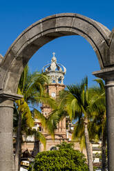 Our Lady of Guadalupe church through the Malecon arches, Puerto Vallarta, Jalisco, Mexico, North America - RHPLF06207