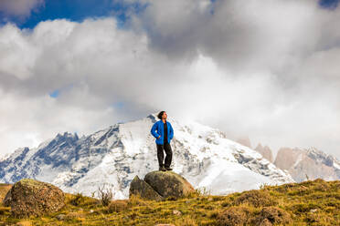 Enjoying the view of the Glacial Lakes, Torres del Paine National Park, Chile, South America - RHPLF06285