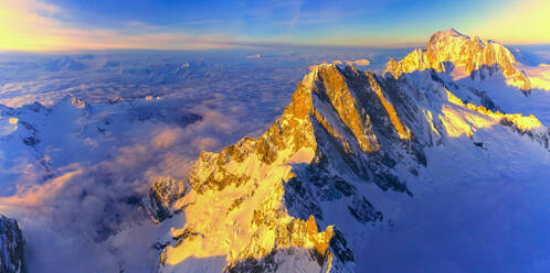 Aerial panoramic of Grandes Jorasses, Petites Jorasses and Mont Blanc at sunrise, Courmayeur, Aosta Valley, Italy, Europe - RHPLF06462