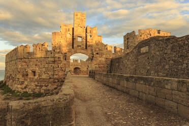 Liberty Gate at sunset, Medieval Old Rhodes Town, UNESCO World Heritage Site, Rhodes, Dodecanese, Greek Islands, Greece, Europe - RHPLF06803