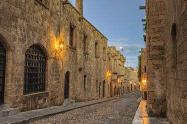 Inns at dusk, Street of the Knights, blue hour, Medieval Old Rhodes Town, UNESCO World Heritage Site, Rhodes, Dodecanese, Greek Islands, Greece, Europe - RHPLF06806