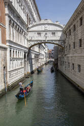 Gondolas under Bridge of Sighs in Venice, Italy, Europe - RHPLF06868