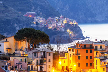 Village of Manarola with houses of Corniglia in the foreground, Cinque Terre, UNESCO World Heritage Site, Liguria, Italy, Europe - RHPLF07188