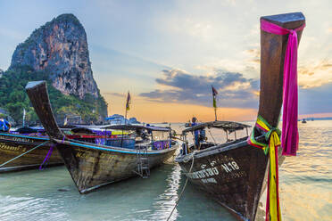 Long tail boats at sunset on Railay beach in Railay, Ao Nang, Krabi Province, Thailand, Southeast Asia, Asia - RHPLF07360