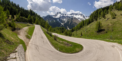 Winding mountain road, Campolongo Pass, Alto Adige, Italy stock photo
