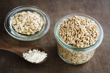 Ancient grains, Einkorn Weat in glas jar as grain, flakes and flour - EVGF03447