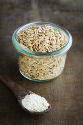 Ancient grains, Einkorn Weat in glas jar as grain and flour - EVGF03448