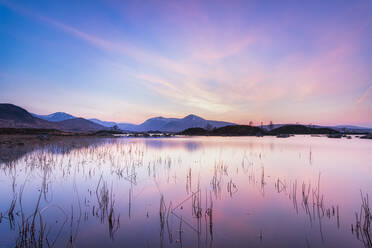 Idyllic shot of Lochan nah Achlaise against sky during sunset, Scottish Highlands, Scotland, UK - SMAF01424