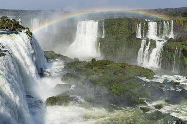 Rainbow over the Iguazu Falls, viewed from the Brazilian side, UNESCO World Heritage Site, Foz do Iguacu, Parana State, Brazil, South America - RHPLF07752