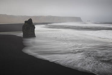 Reynisdrangar basalt rock columns and black sand beach in Vik, Iceland, Polar Regions - RHPLF08107