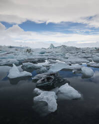 Icebergs floating in Jokulsarlon Glacier Lagoon, Iceland, Polar Regions - RHPLF08113