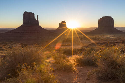 Sunrise at Monument Valley, Navajo Tribal Park, Arizona, United States of America, North America - RHPLF08173
