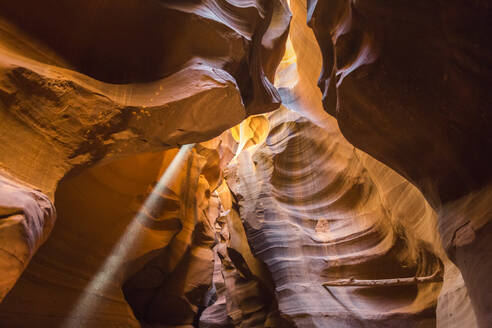 Ray of light through Upper Antelope Canyon, Navajo Tribal Park, Arizona, United States of America, North America - RHPLF08178