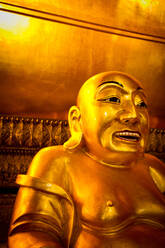 Ein lächelnder Buddha im Wat Pho (Wat Po), Bangkok, Thailand, Südostasien, Asien - RHPLF08180