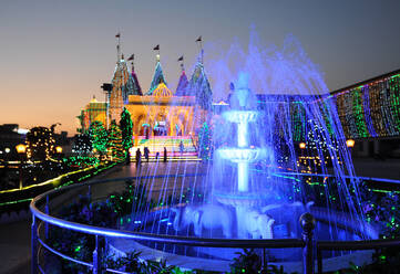 Diwali festival lights illuminating the beautiful white marble Swaminarayan Temple, Mandvi, Gujarat, India, Asia - RHPLF08332