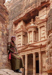 Jordanian Army Soldier in front of The Treasury (Al-Khazneh), Petra, UNESCO World Heritage Site, Ma'an Governorate, Jordan, Middle East - RHPLF08415