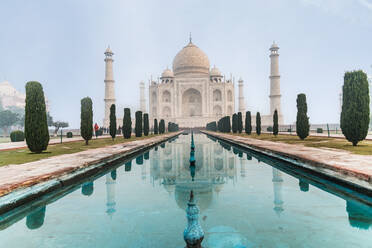 Taj Mahal reflections on a misty morning, UNESCO World Heritage Site, Agra, Uttar Pradesh, India, Asia - RHPLF08507