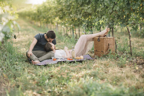 Young couple in love having picnic in the vineyards - ALBF01013