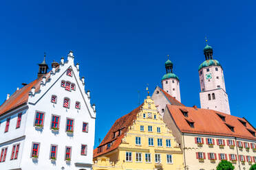 Low angle view of historic architecture and church against clear blue sky at Wemding, Bavaria, Germany - SPCF00453