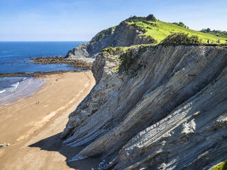 Scenic view of cliff by sea at Basque Coast Geopark, Spain - LAF02362