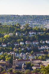 Church and residential buildings amidst trees at Hasenbergsteige, Stuttgart, Baden-Württemberg, Germany - WDF05473