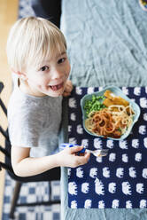 Boy eating pasta - JOHF00033