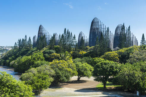 View of Jean-Marie Tjibaou Cultural Centre against blue sky at sunny day, Noumea, New Caledonia - RUNF02954