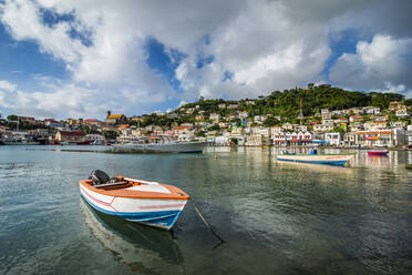 Motorboat in harbor of St Georges, capital of Grenada, Caribbean - RUNF03004