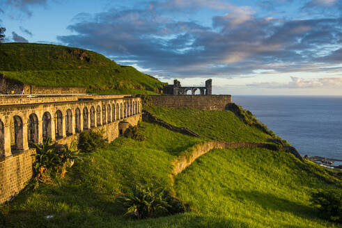 Brimstone hill fortress by sea against sky, St. Kitts and Nevis, Caribbean - RUNF03029