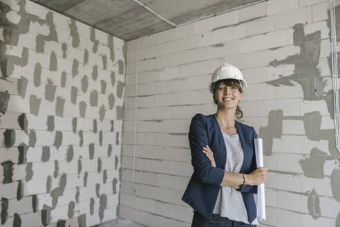 Portrait of female architect on construction site - AHSF00815