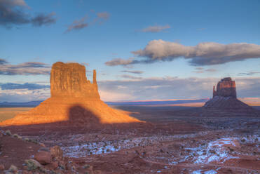 Sunset, West Mitten Butte on left, and East Mitten Butte on right, Monument Valley Navajo Tribal Park, Utah, United States of America, North America - RHPLF08775