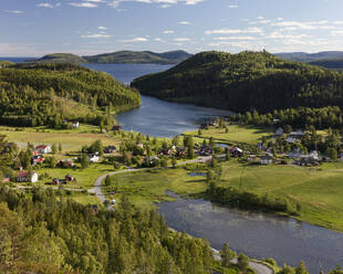 Town by forest and river in High Coast, Sweden - FOLF11114